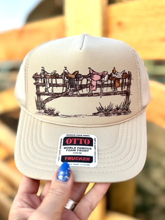 Hand drawn saddles on fence Dash western trucker hat